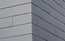 How do flat lock seam metal roofing systems compare to standing seam options?